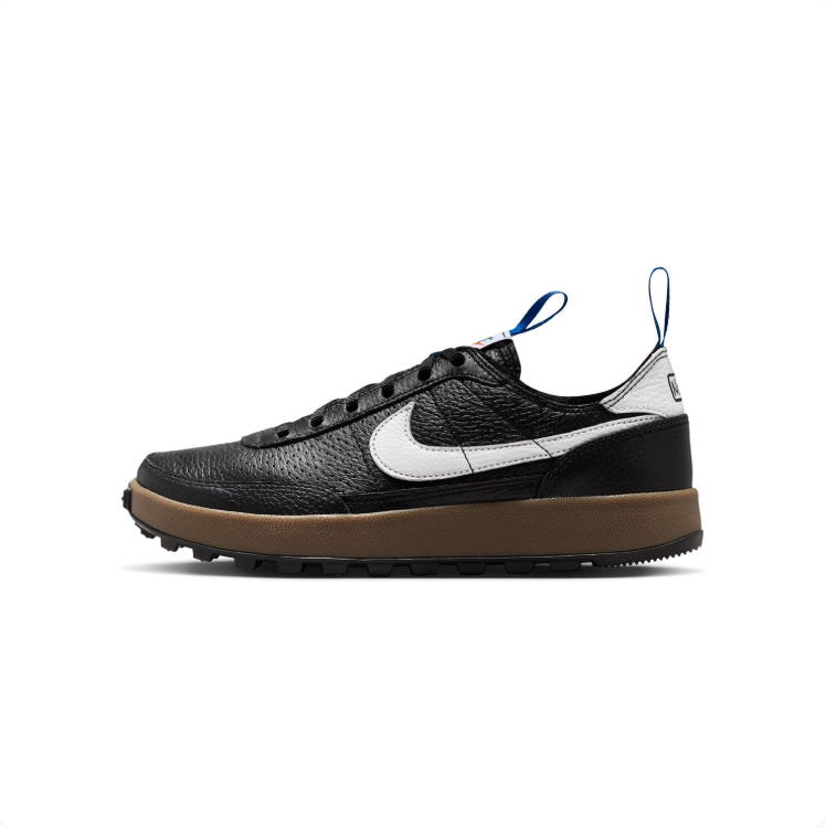 Nike Black and White Gum-Sole Sneakers with Blue Pull Tabs