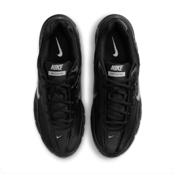Nike Black & Silver Low-Top Sneakers | Layered Upper & Chunky Sole