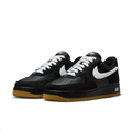Nike Black & White Low-Top Sneakers | White Swoosh & Gum-Colored Sole