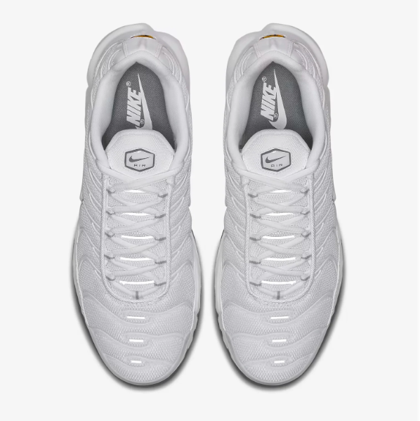 Nike White Low-Top Sneakers | Curved Overlays & Visible Sole Windows